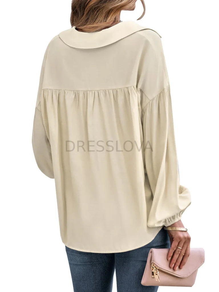 Bluse mit Wickelausschnitt und Saum